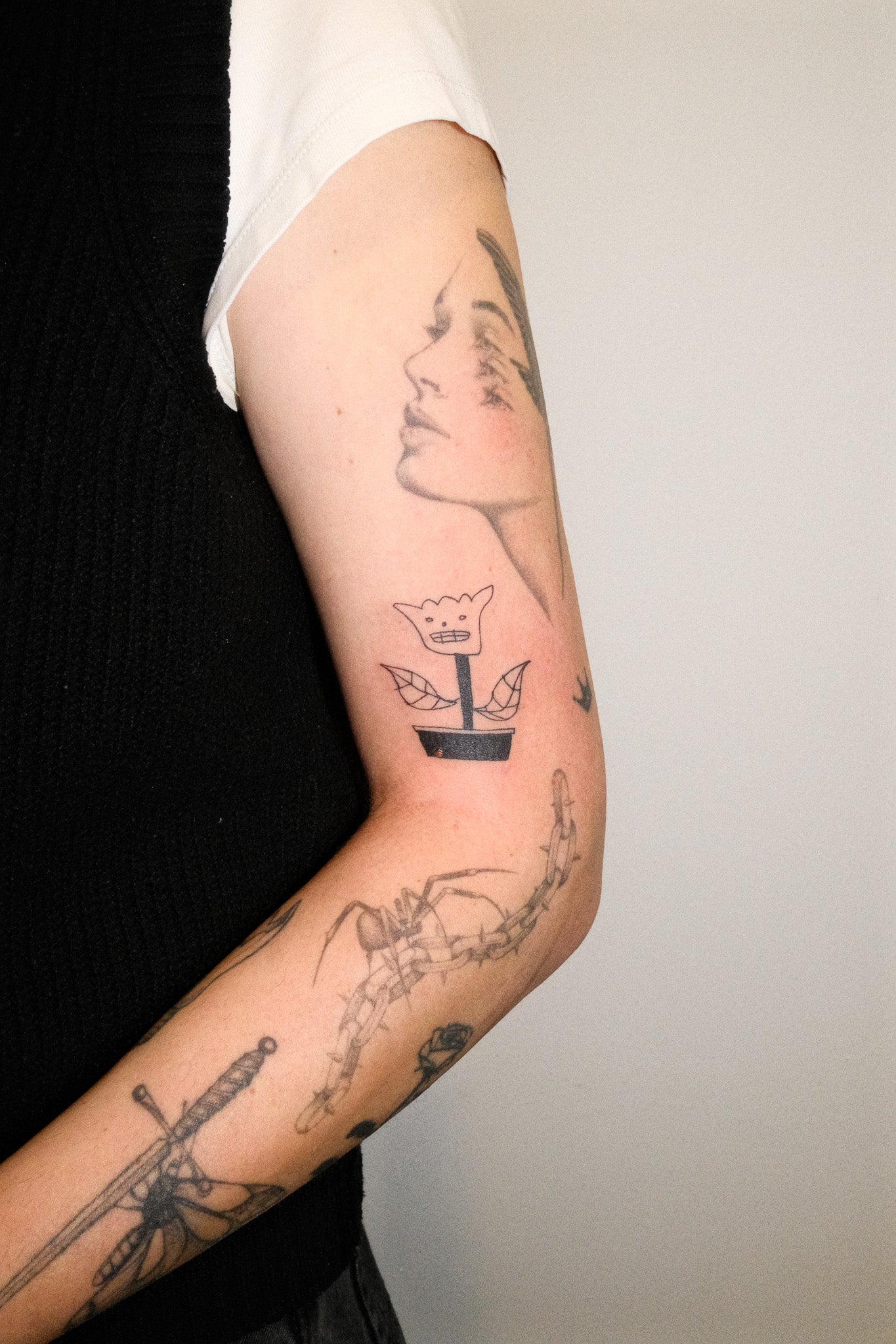 This tattoo is one of the favourites I have done in a while. I like how it fits in (doesnt fit in) with the rest. I also like the line weight. It is scratchy in a cute way.