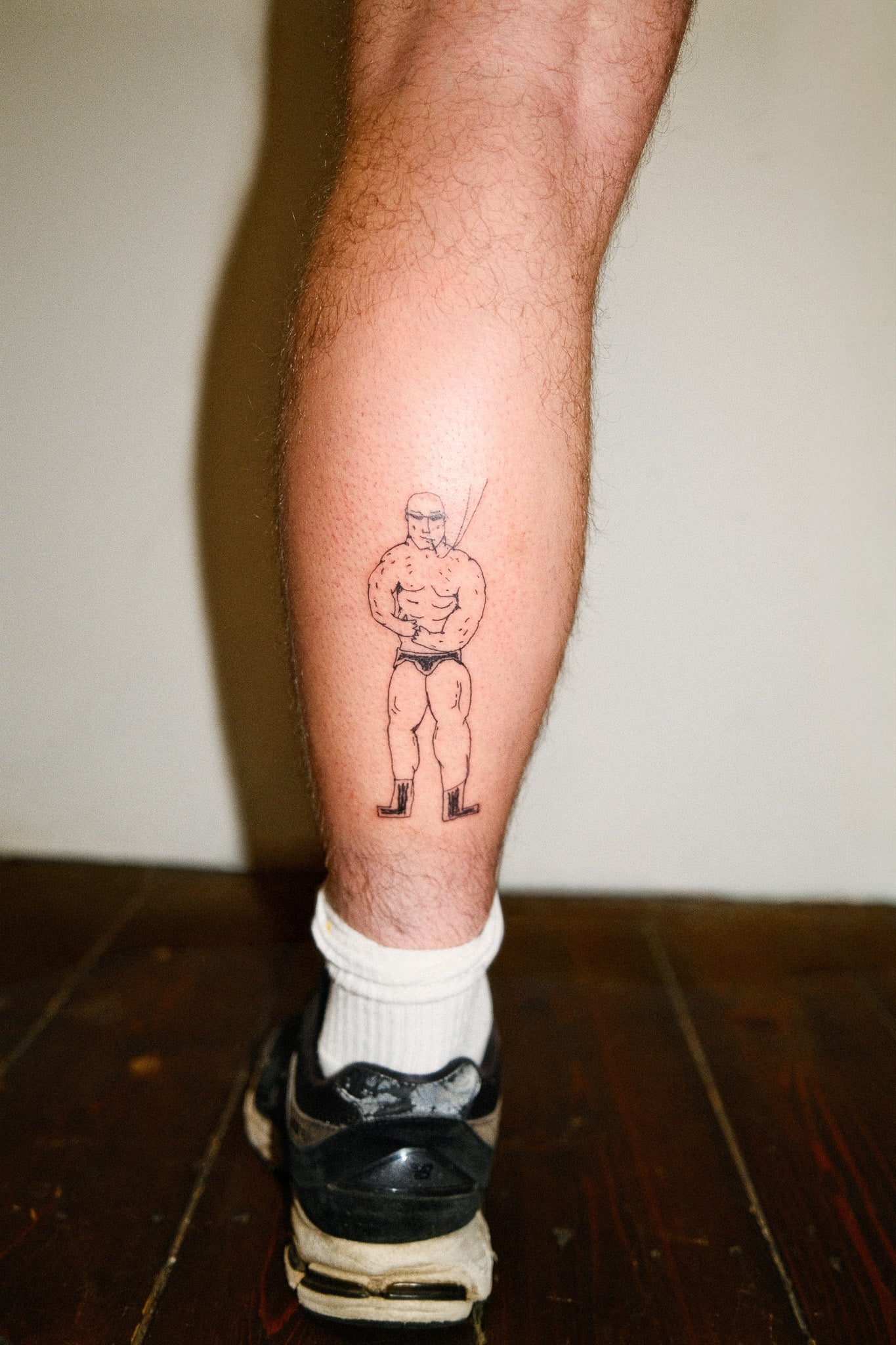 I love this design. I know its hard to see the actual tattoo, but I like the tattoo and photo together as a whole.